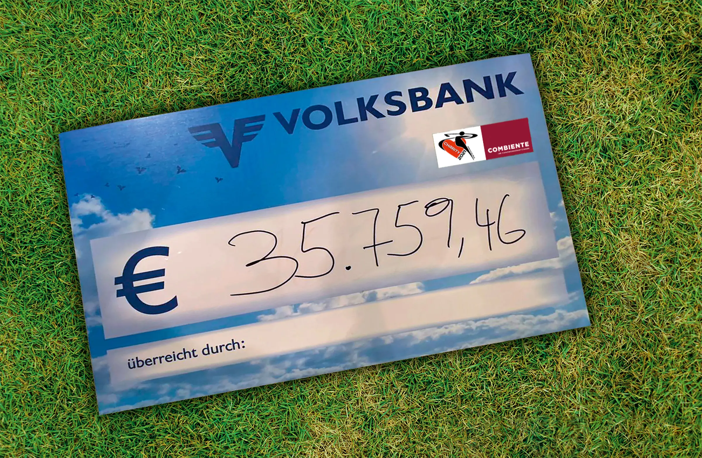 Scheck des Charity Golf Turniers 2021